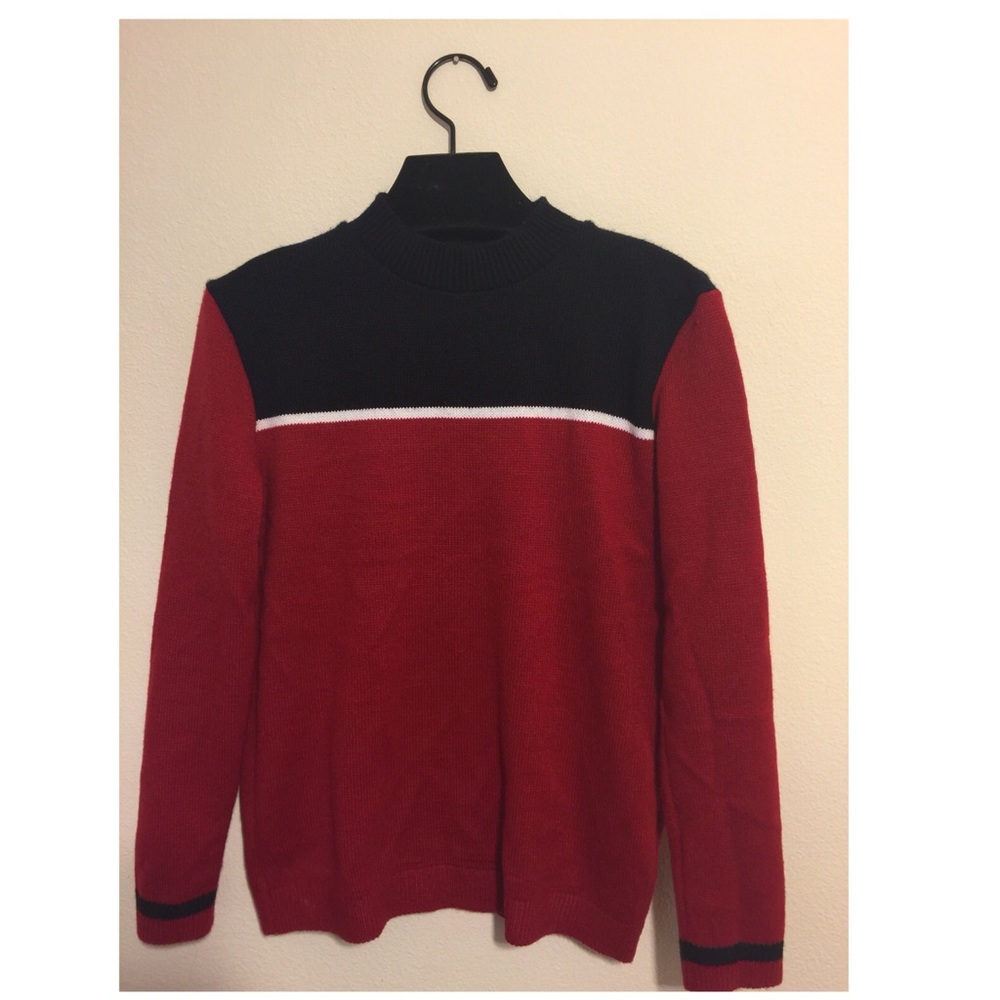 Red and navy sweater with a white stripe